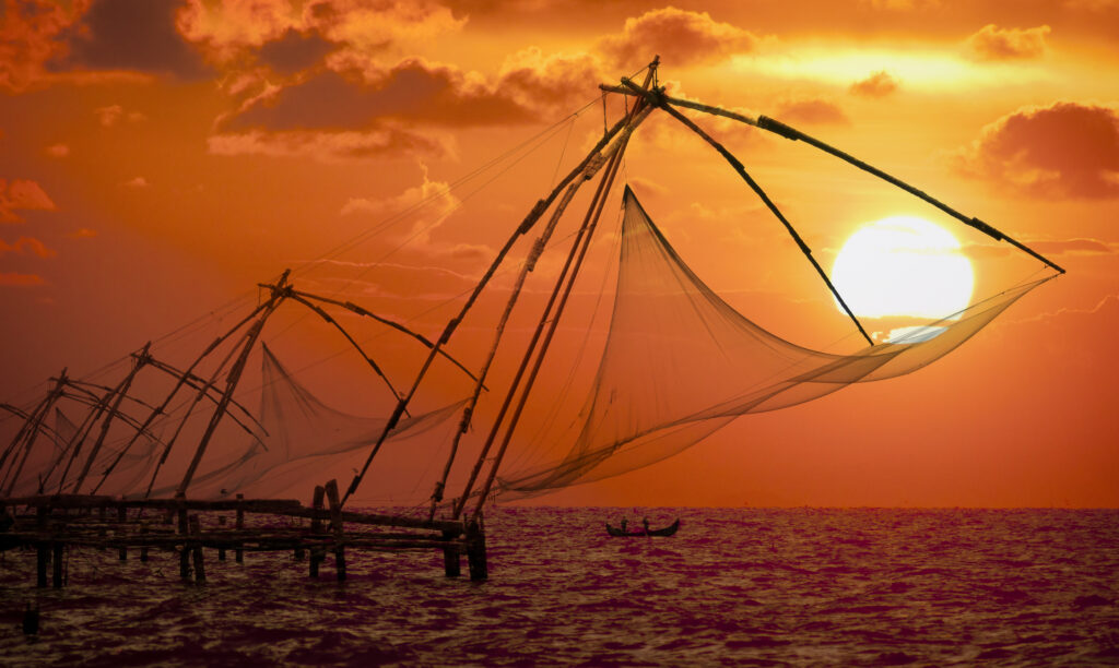 Sunset over Chinese fishing nets in Kochi