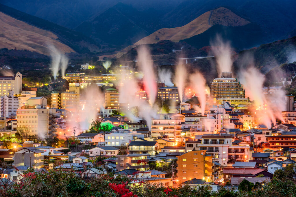 Beppu, Japan cityscape with hot spring baths with rising steam