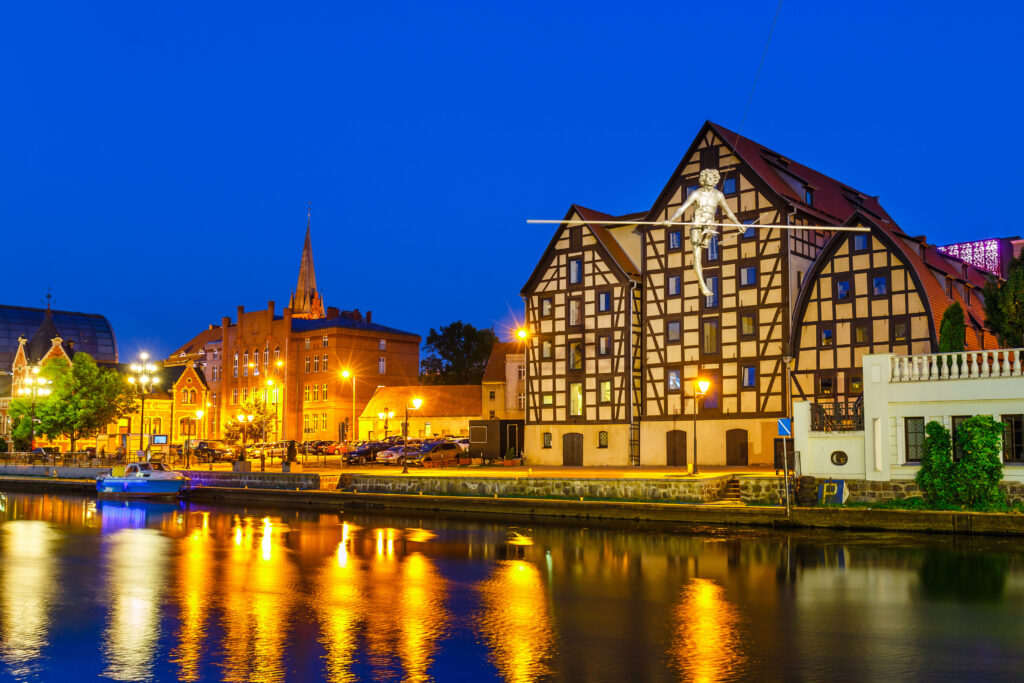 Bydgoszcz waterfront on the river Brda with famous granaries at night