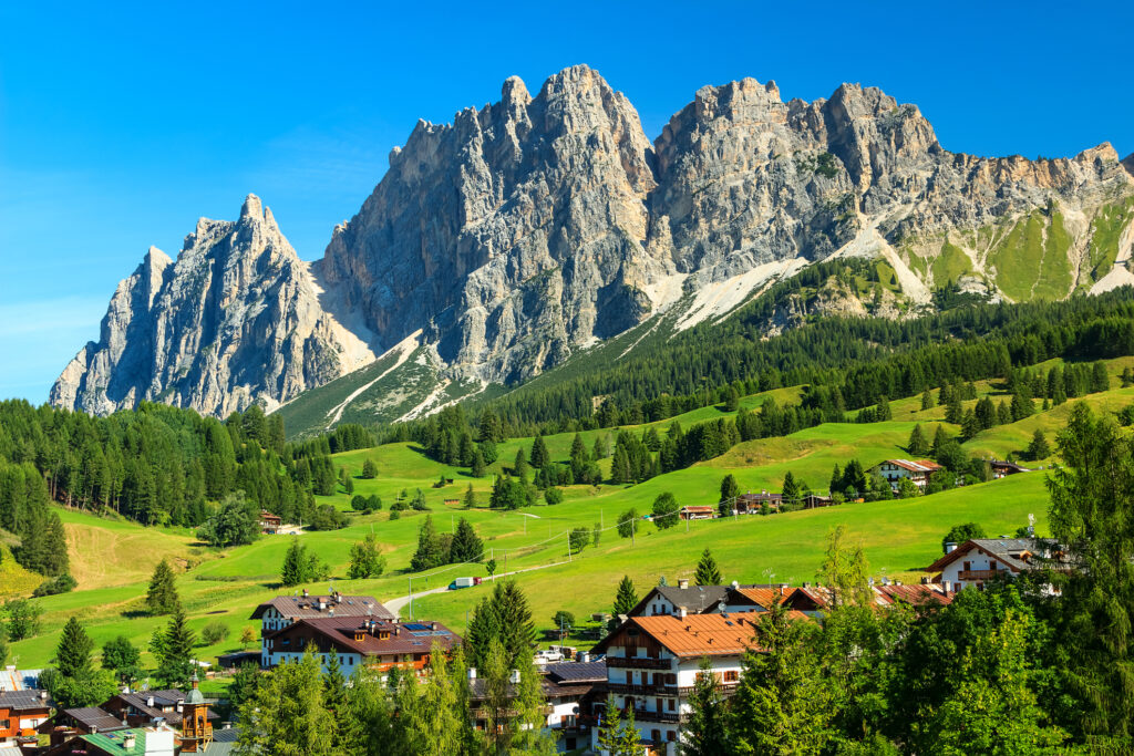 Green meadows and high mountains above Cortina D'Ampezzo, Italy