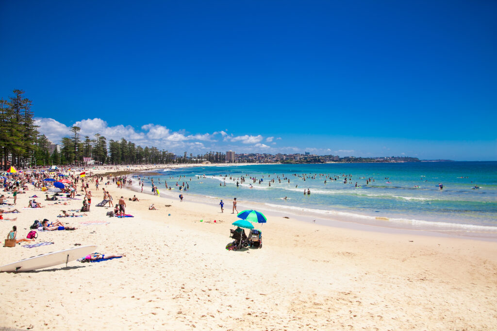 People relaxing at Manly beach in Sydney, Australia